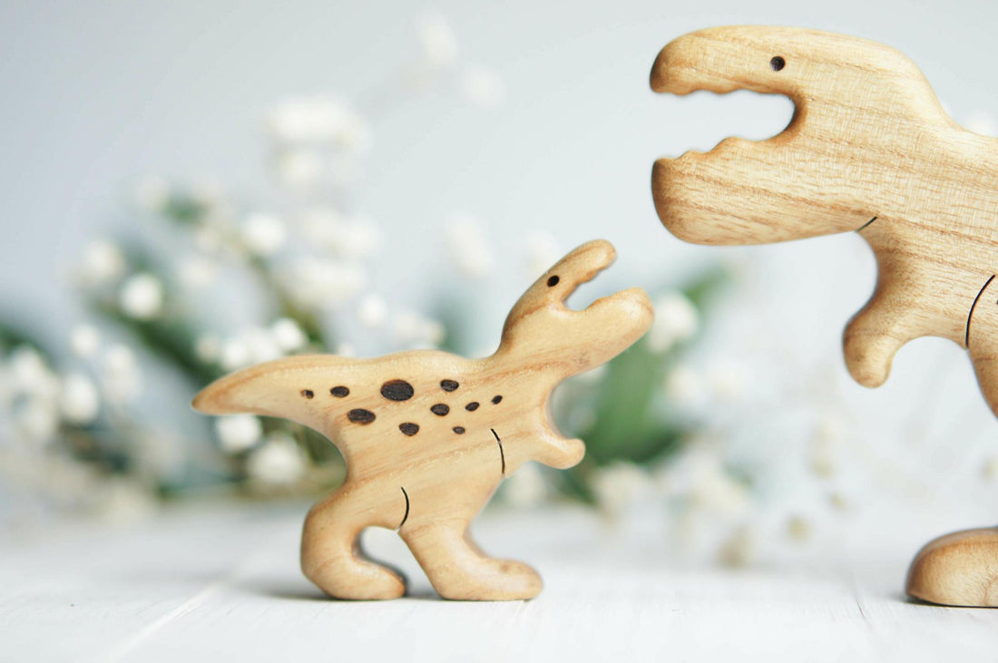 Wooden Baby T-Rex, a natural wood animal toy by Tiny Fox Hole, cut and finished by hand from solid wood