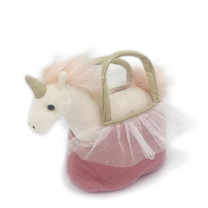 Mon Ami Ophelia unicorn plush toy tucked inside a soft carry purse