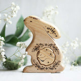 Wooden Bunny Announcement Puzzle with a baby tucked inside the belly, a wooden new-baby keepsake by Tiny Fox Hole, cut and finished by hand · view 1