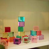 Bauspiel pastel lucent cubes stacked on a shelf · view 1