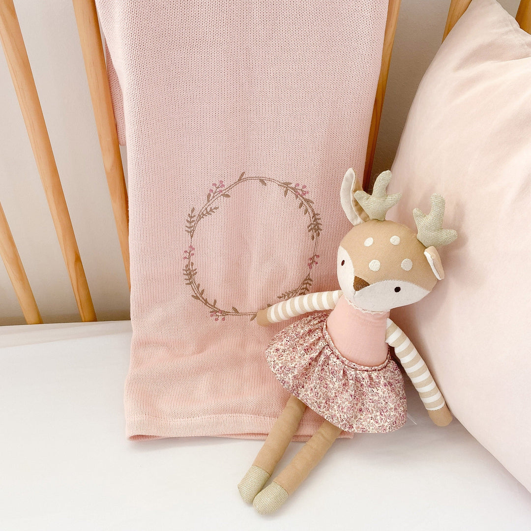 Mon Ami pink double-sided baby blanket with an embroidered wreath