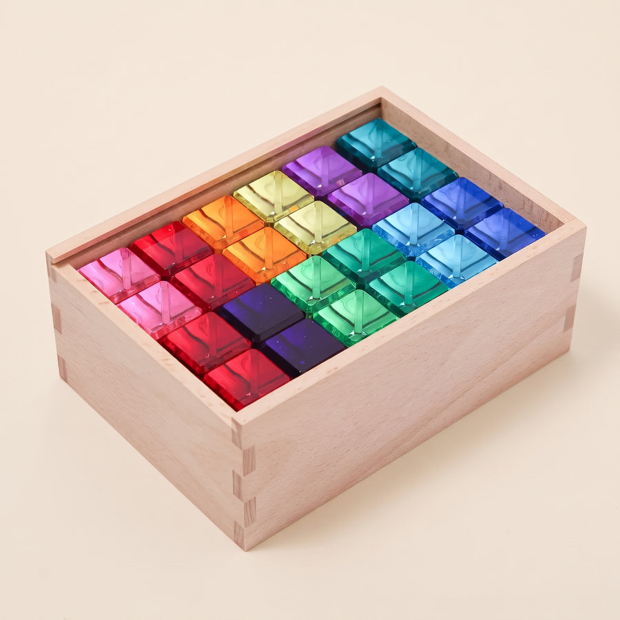 Bauspiel Luminous Blocks, 24 translucent blocks in their wooden storage box