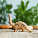 Wooden Baby Brontosaurus, a natural wood animal toy by Tiny Fox Hole, cut and finished by hand from solid wood · view 1