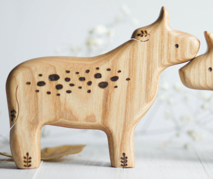 Wooden Bull, a natural wood animal toy by Tiny Fox Hole, cut and finished by hand from solid wood