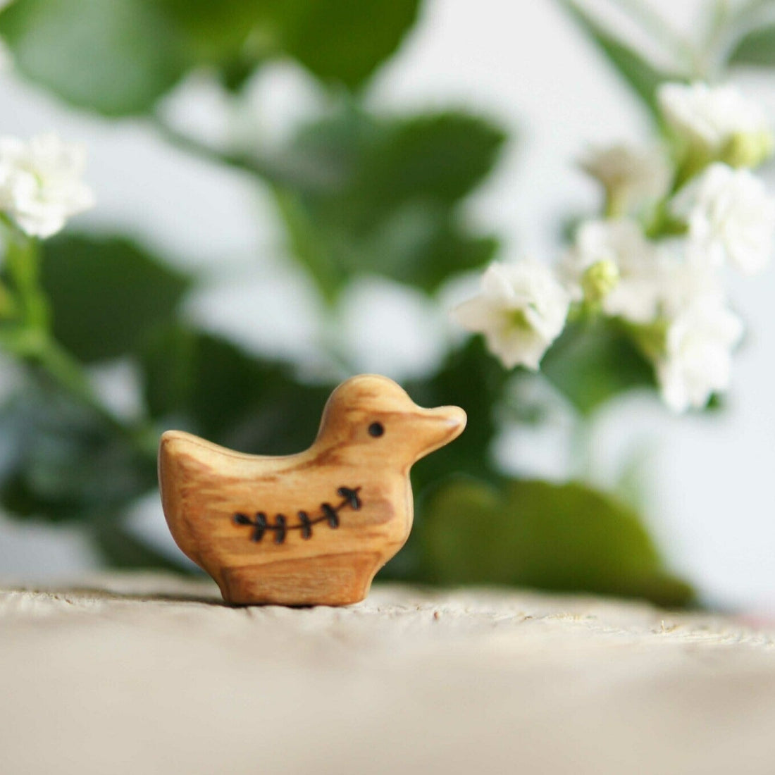 Wooden Duckling, a natural wood animal toy by Tiny Fox Hole, cut and finished by hand from solid wood