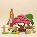 Second view of the wooden cherry tree showing the layered canopy · view 2