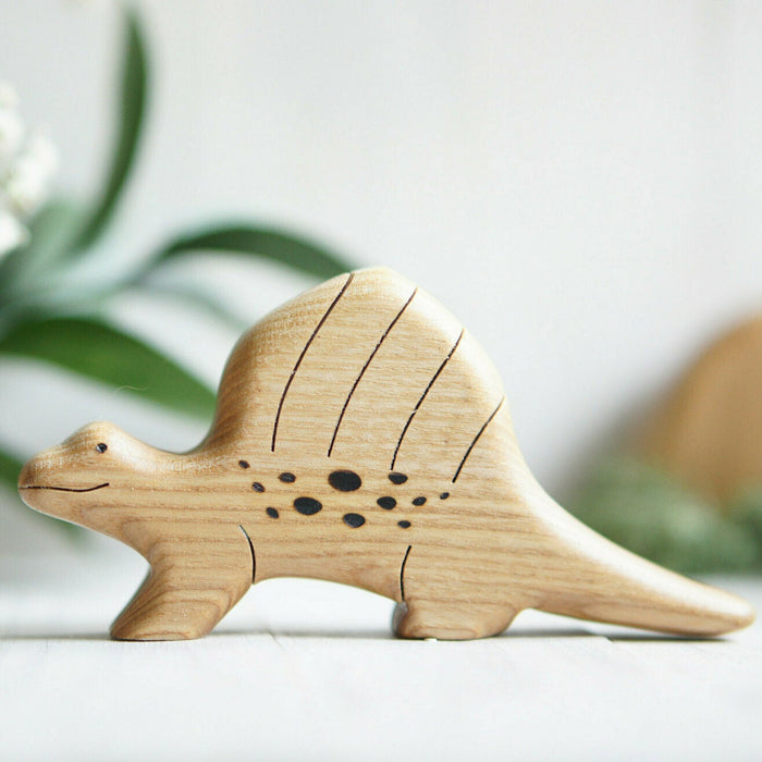 Wooden Dimetrodon, a natural wood animal toy by Tiny Fox Hole, cut and finished by hand from solid wood