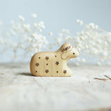 Wooden Lamb, Lying, a natural wood animal toy by Tiny Fox Hole, cut and finished by hand from solid wood · view 1